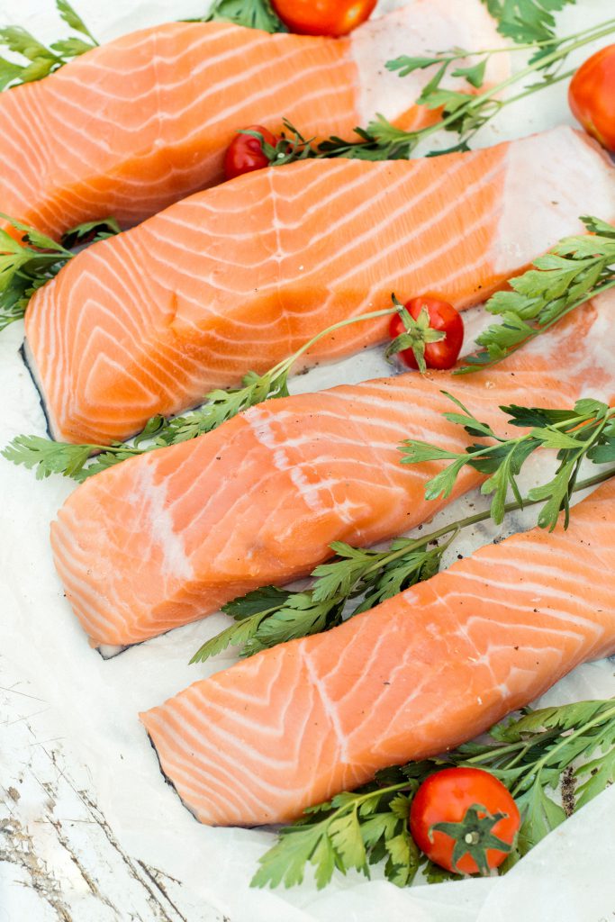 Raw salmon fish on the table from above,selective focus